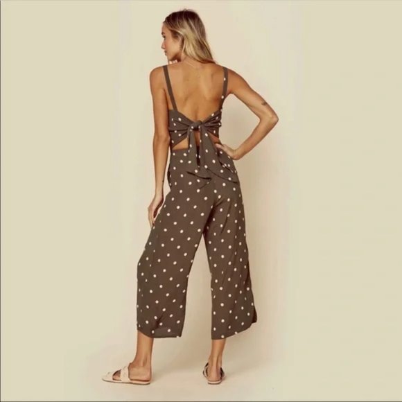 Anthropologie Pants - NWOT Anthropologie green jumpsuit with bow tie in the back